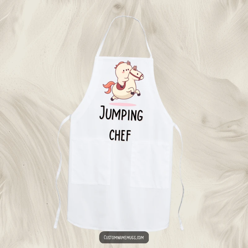Funny kitchen apron showing a small blob character riding a large bouncy ball like a horse, perfect for playful cooking sessions.