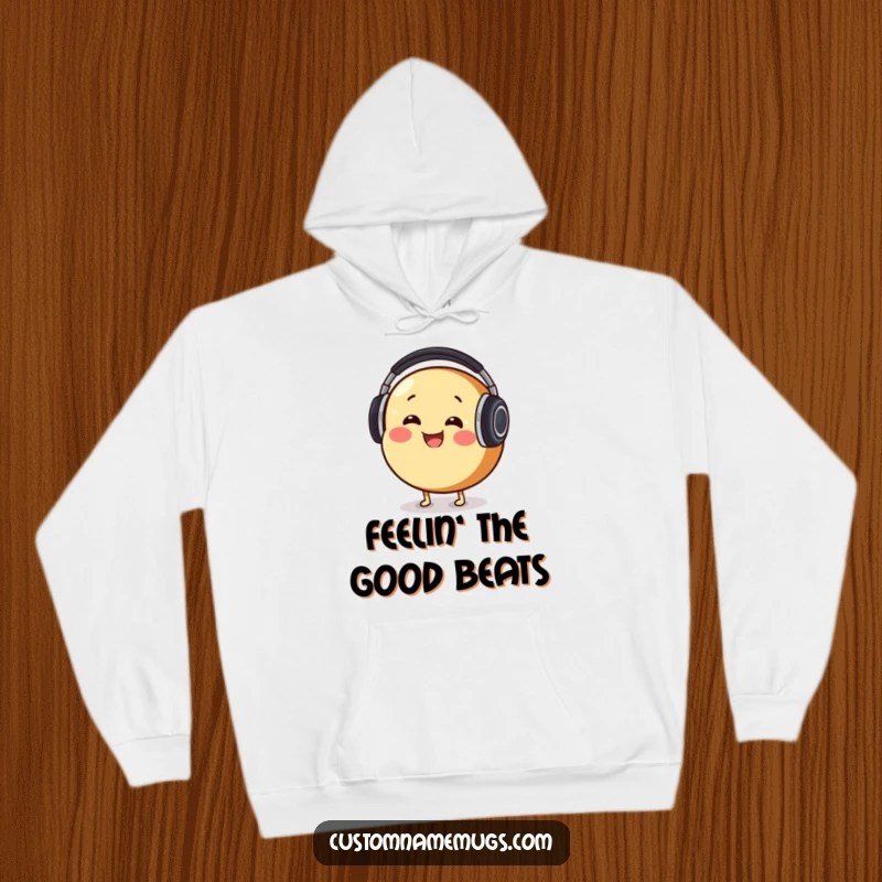 Funny Hoodie: Smiling round bread character comically wearing massive headphones, bobbing its head with musical enjoyment.