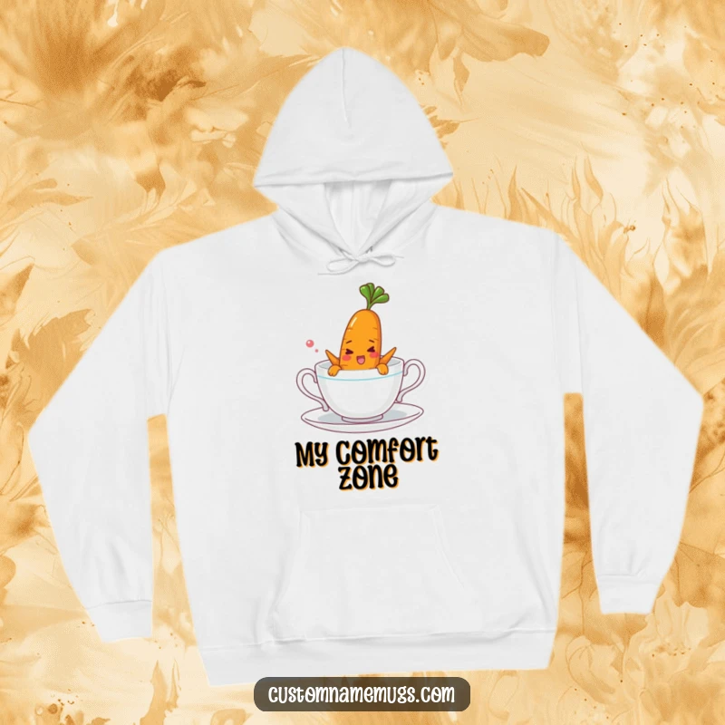 Funny hoodie featuring a cheerful carrot character comically attempting to swim in a small teacup, offering warmth and playful charm.