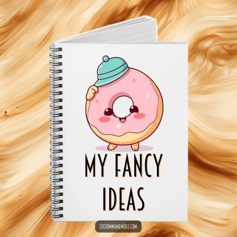 Funny donut hat notebook cover showing a cheerful donut character comically trying to wear a tiny hat, symbolizing sweet ideas and playful thoughts.