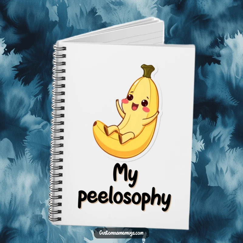 Funny Kawaii banana character ecstatically sliding down a peel, gracing the cover of a notebook, ideal for journaling.