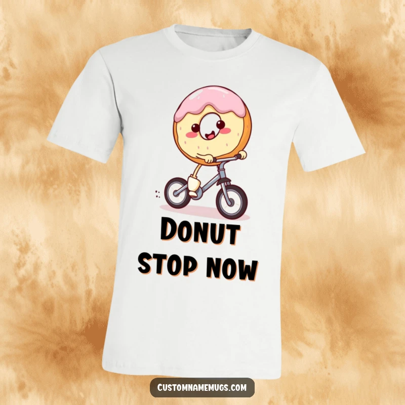 Funny t-shirt featuring a smiling, round donut character with tiny legs riding a miniature unicycle with enthusiasm. Whimsical and humorous.