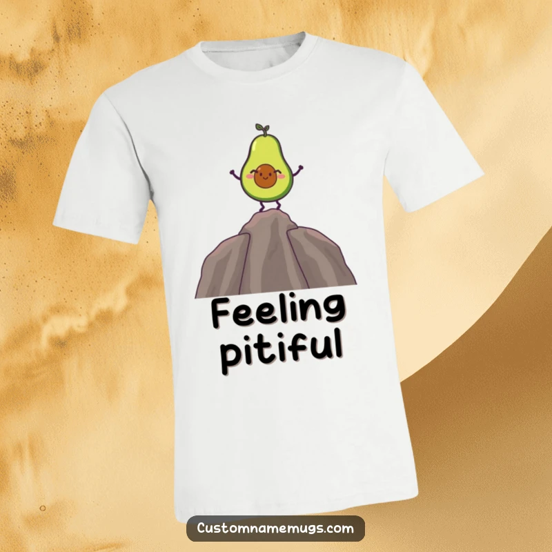Funny t-shirt showcasing a giggling avocado balancing precariously on its pit, celebrating food-themed humor.