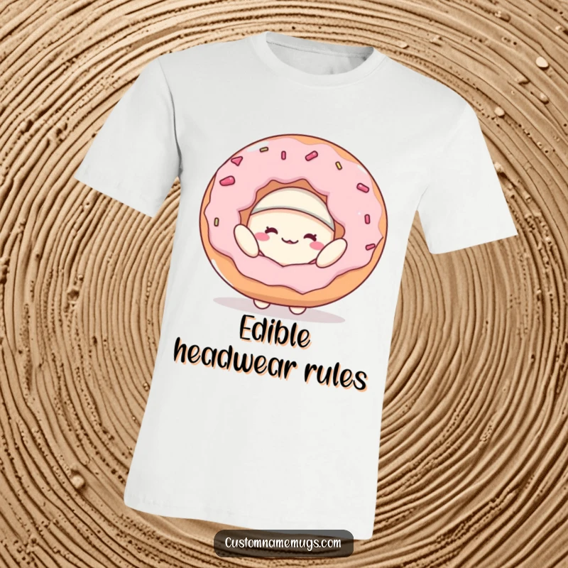 Funny t-shirt showcasing a happy blob character playfully attempting to balance a giant donut hat on its head, a symbol of sugary silliness.