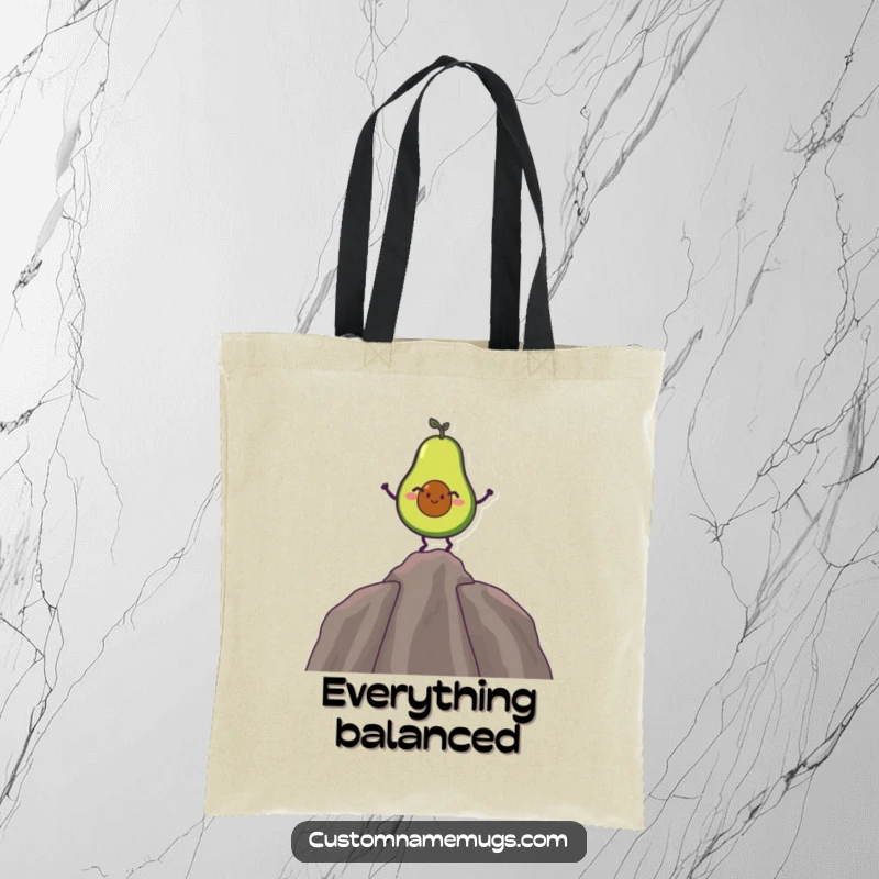 Funny tote bag featuring a giggling avocado balancing on its pit, a humorous and practical accessory.