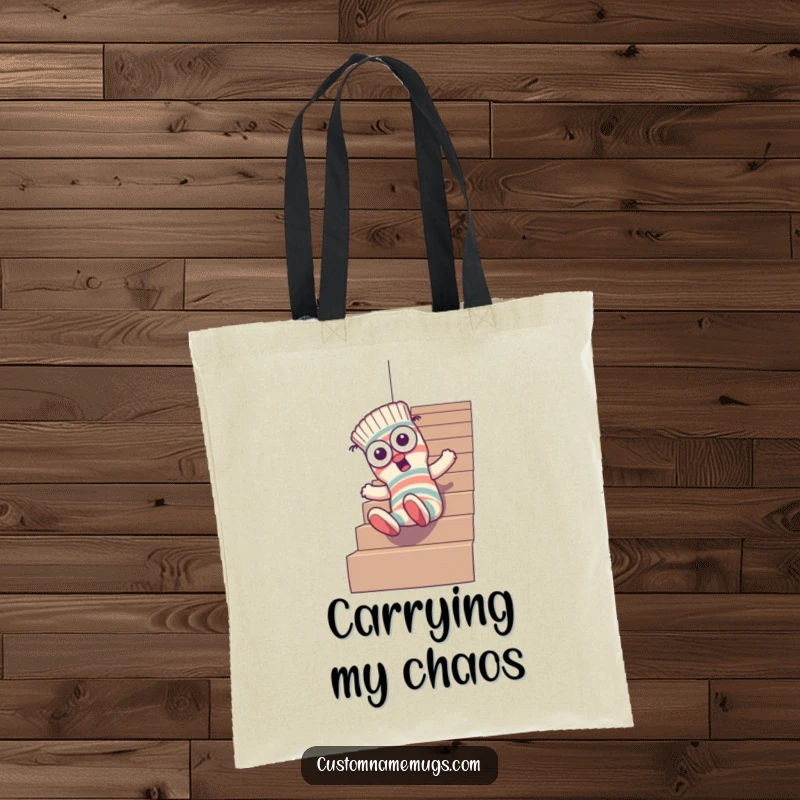 Funny tote bag showcasing a goofy sock character with mismatched eyes comically tumbling down stairs, perfect for carrying groceries or lost socks.